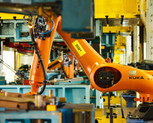 KUKA robot in a manufacturing setting